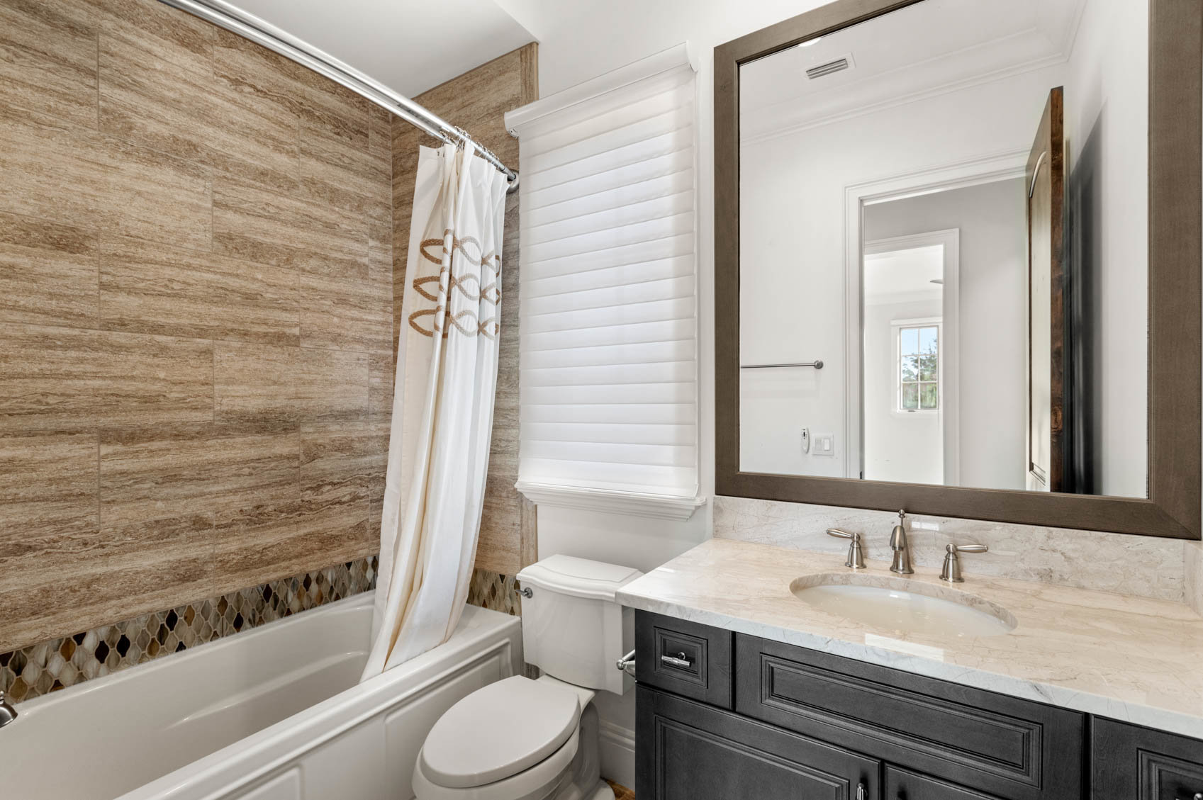 bathroom with sink and tub